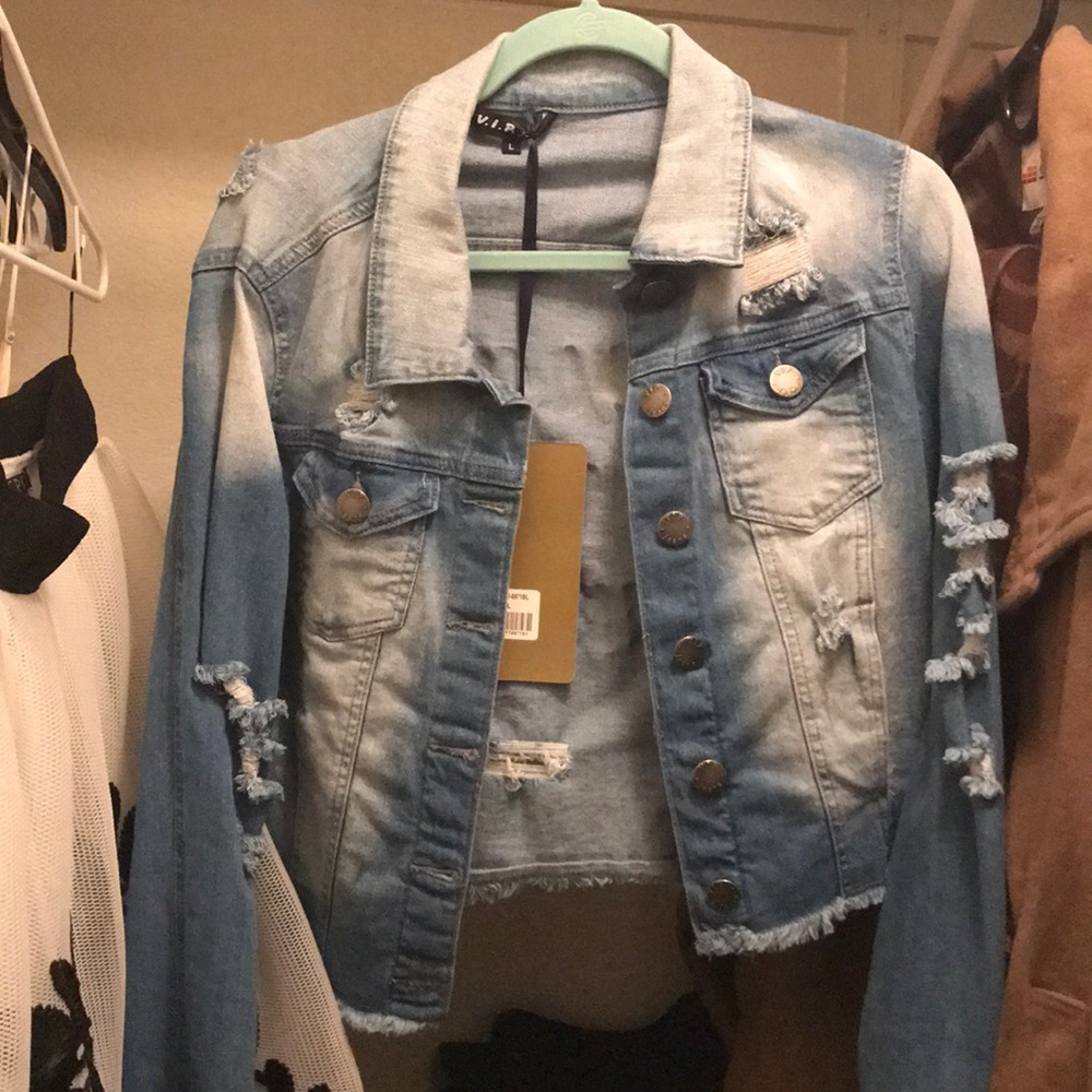 A never worn large jean jacket.